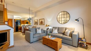 Main Floor - Living Room With Gas Fireplace & Queen Sofabed