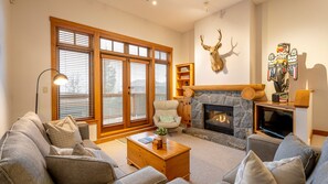 Main Floor - Living Room With Gas Fireplace & Queen Sofabed