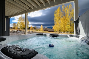 Enjoy the view from the private hot tub, located on the lower level patio.