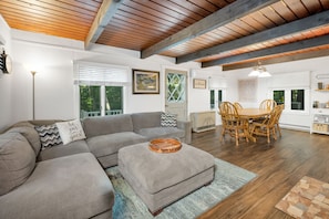 Comfortable open concept living, cozy wood ceilings