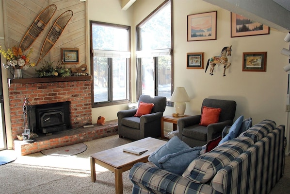 Comfortable, Bright Living Room with Wood Burning Stove