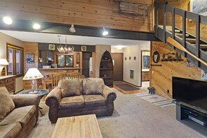 Open floor plan living room with TV