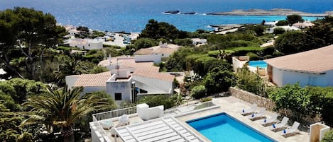 Private swimming pool with sea views