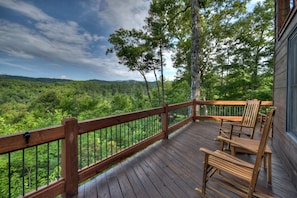 Peacefully sway in the rocking chairs while enjoying the mountain views.