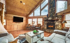 Sink into the couch after a day of exploring in front of the gas fireplace and 65" smart TV.