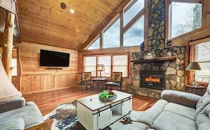 Sink into the couch after a day of exploring in front of the gas fireplace and 65" smart TV.