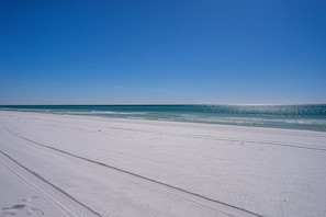 Pristine sugary white sand. A 15-min walk or 3 min drive from you door.