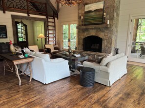 Main living room. Outdoor living room is just outside double doors.