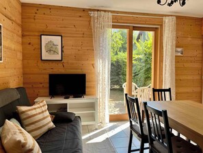Lovely lounge/kitchen with patio doors to the terrace
