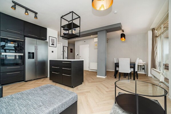 Large indoor social space with access to great terrace