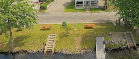 House and waterfront yard with dock