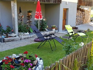 Plant, Flower, Botany, Outdoor Furniture, Outdoor Table, Grass, Chair, Shade, Leisure, Landscape