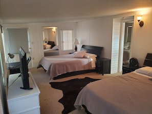 2nd bedroom with 2 queen beds, TV, desk and fireplace