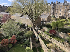 Wide-angled views to the very attractive residential gardens below.