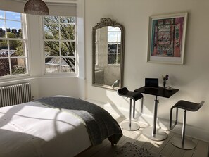 Large full length mirror. Column radiator with thermostatic valve.