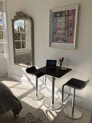 Bar table and stools, ideal for dining, but also can be used as a workspace.