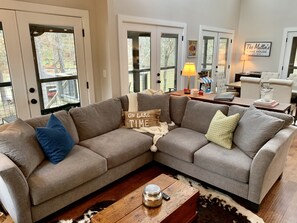 Inviting living room with gas fireplace, game and a Smart TV.