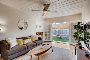 French doors open up to create indoor/outdoor living.