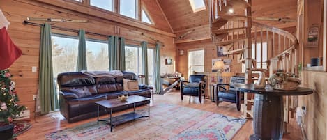 Cozy, sun-drenched Great Room w/ spectacular gas fireplace