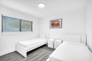 Each bedroom is furnished with cozy beds and freshly laundered sheets.