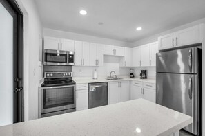 Enter a well-appointed kitchen, fully equipped with all the essentials you require to prepare your favorite meals.