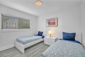 The spacious bedrooms offer fresh linens, inviting mattresses, and sumptuous pillows to enhance your night's sleep.