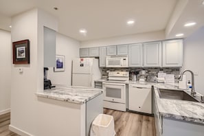 Bright, open kitchen with new granite countertops!