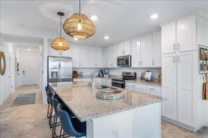 Entryway into the Bright & Inviting Kitchen