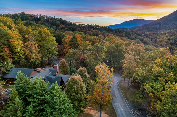 Aerial photo showcases not only our beautiful home, but also the serene and picturesque neighborhood it's nestled in.