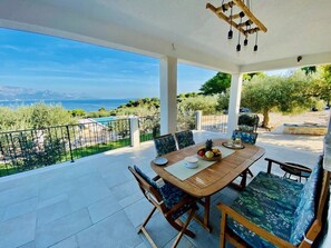 Sitting area on the terrace infront of the house with perfect sea view 