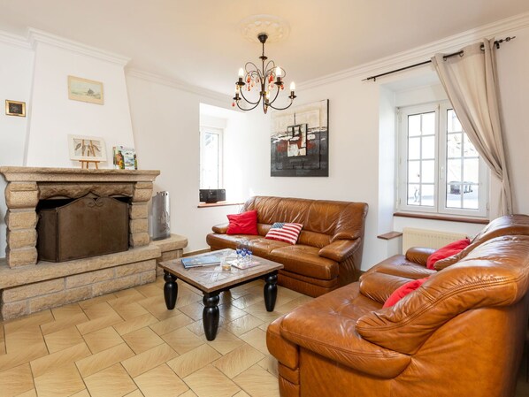 Furniture, Interior Design, Flooring, Floor, Wood, Room, Ceiling, Living Room, Couch, Lighting