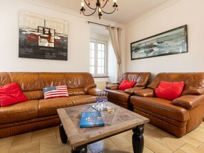 Furniture, Couch, Interior Design, Flooring, Living Room, Wood, Floor, Room, Picture Frame