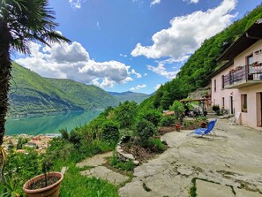 Cloud, Plant, Water, Sky, Water Resources, Green, Azure, Building, Highland, Natural Landscape