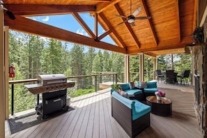 Expansive Covered Deck w/ an Outdoor Fireplace, Sectional Couch, Gas Patio Table, & Amazing Views!!