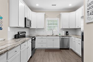 The family chef will love the modern kitchen with plenty of counter space.