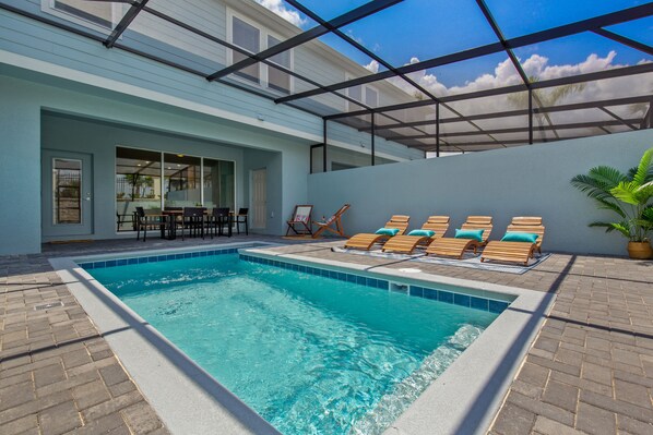 Luxurious Pool with Loungers and Patio Seating  (Pool Heat & Grill Rentals Available for Additional Fee)