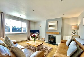 16 Beatrice Avenue, Shanklin: Sitting area with wood burning stove