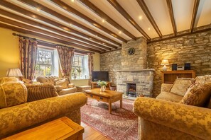 Theaked Stones Cottage, near Leyburn: Spacious sitting room with wood burning stove
