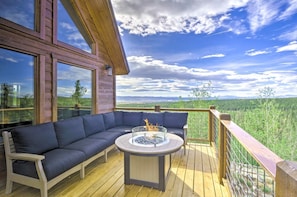 Relax and enjoy the views with the propane fire pit on the deck!