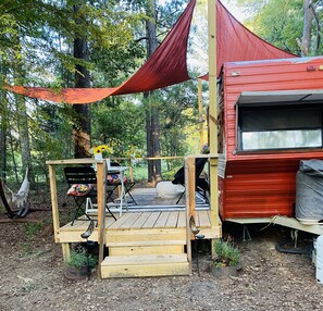 Sun sails cover the deck and camper to keep it cool on summer days 