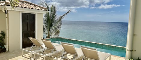 Relax in our ultra private pool overlooking the sea.