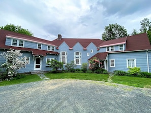 This grand estate blends old-world charm with modern comforts, offering a chateau-like ambiance