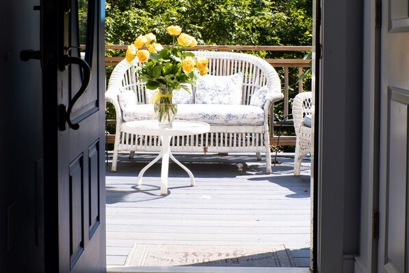 On a sunny day, going out to the deck for a relaxing afternoon.