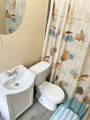 Super clean bathroom with all of the essentials