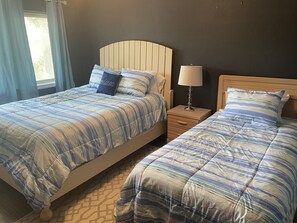 Updated 2nd bedroom with a queen and a twin bed