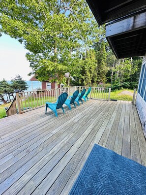 Enjoy ocean views from the front deck. Beach access from the front yard.