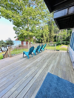 Enjoy ocean views from the front deck. Beach access from the front yard.