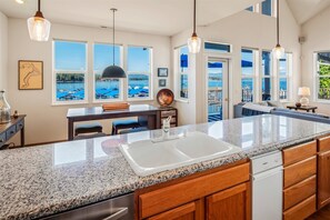 Great kitchen with water and mountain views.