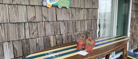 Custom outdoor surfboard table to enjoy the view.