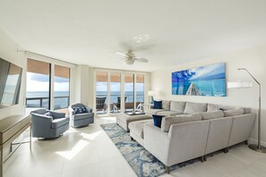 Cozy great room leading to the waterfront terrace overlooking Gulf of Mexico.